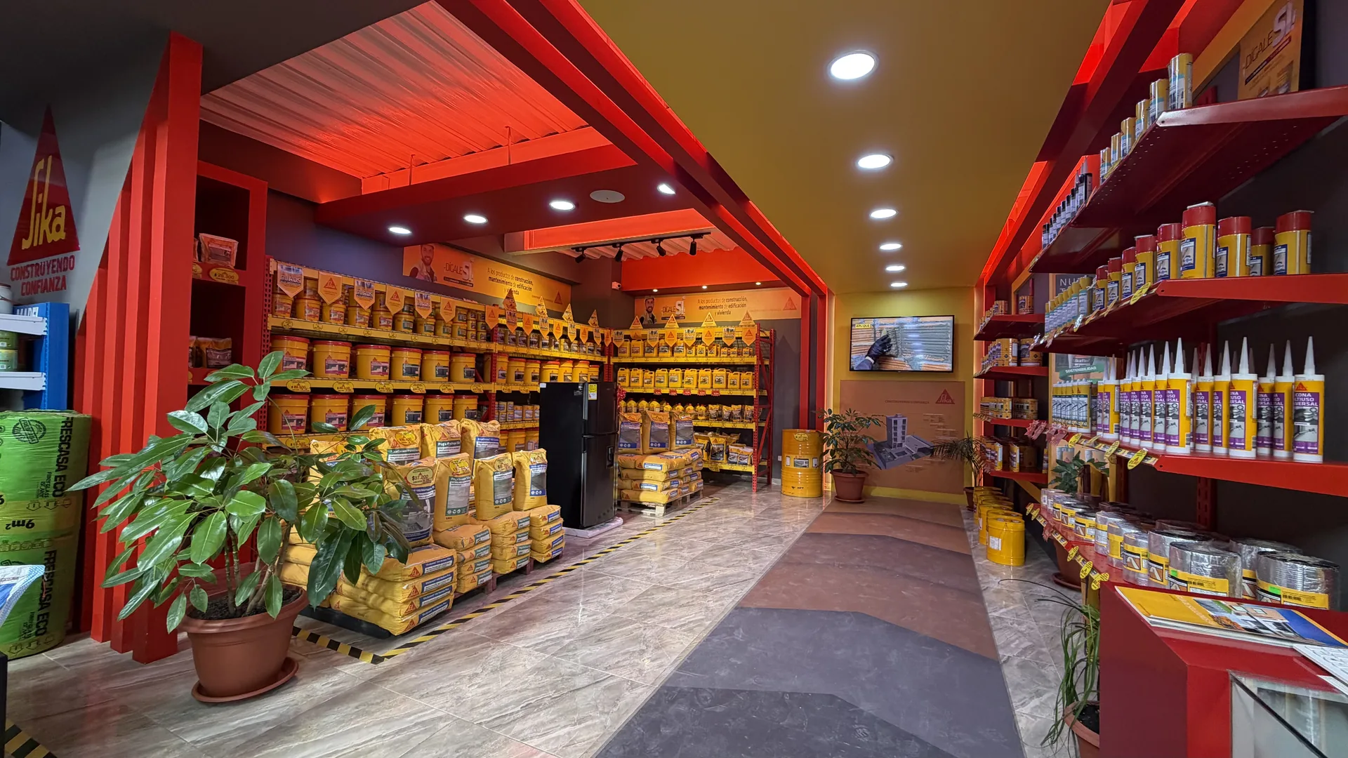 Interior de sección de construcción con productos Sika bien organizados